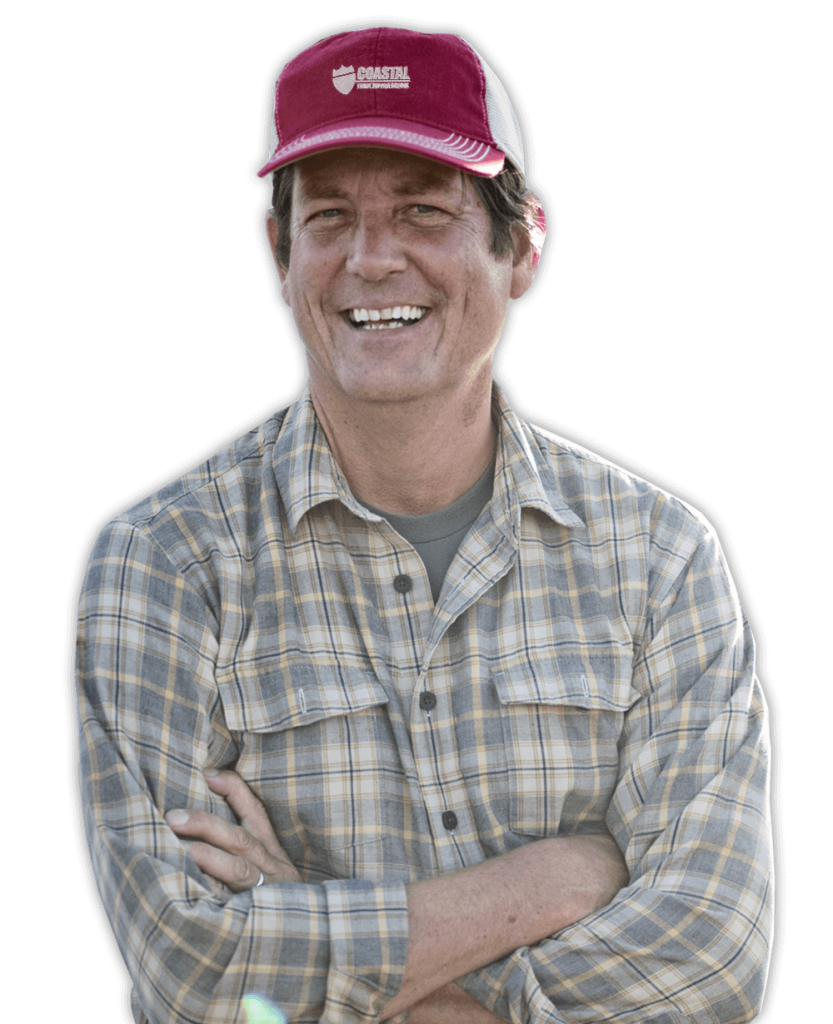 Coastal Truck Driving student crossed arms smiling