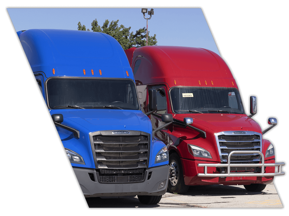 Blue and red trucks lined up for fleet driver training companies in Arkansas